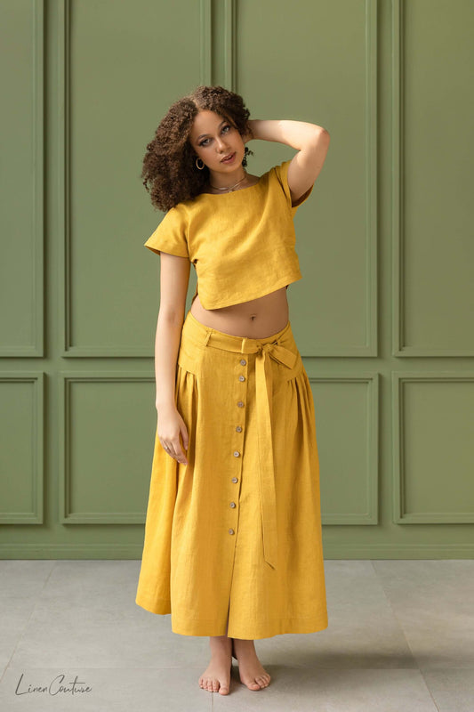 Taormina Set | Linen Crop Top and Flared Midi Skirt in yellow, showcasing summer elegance and chic sophistication.