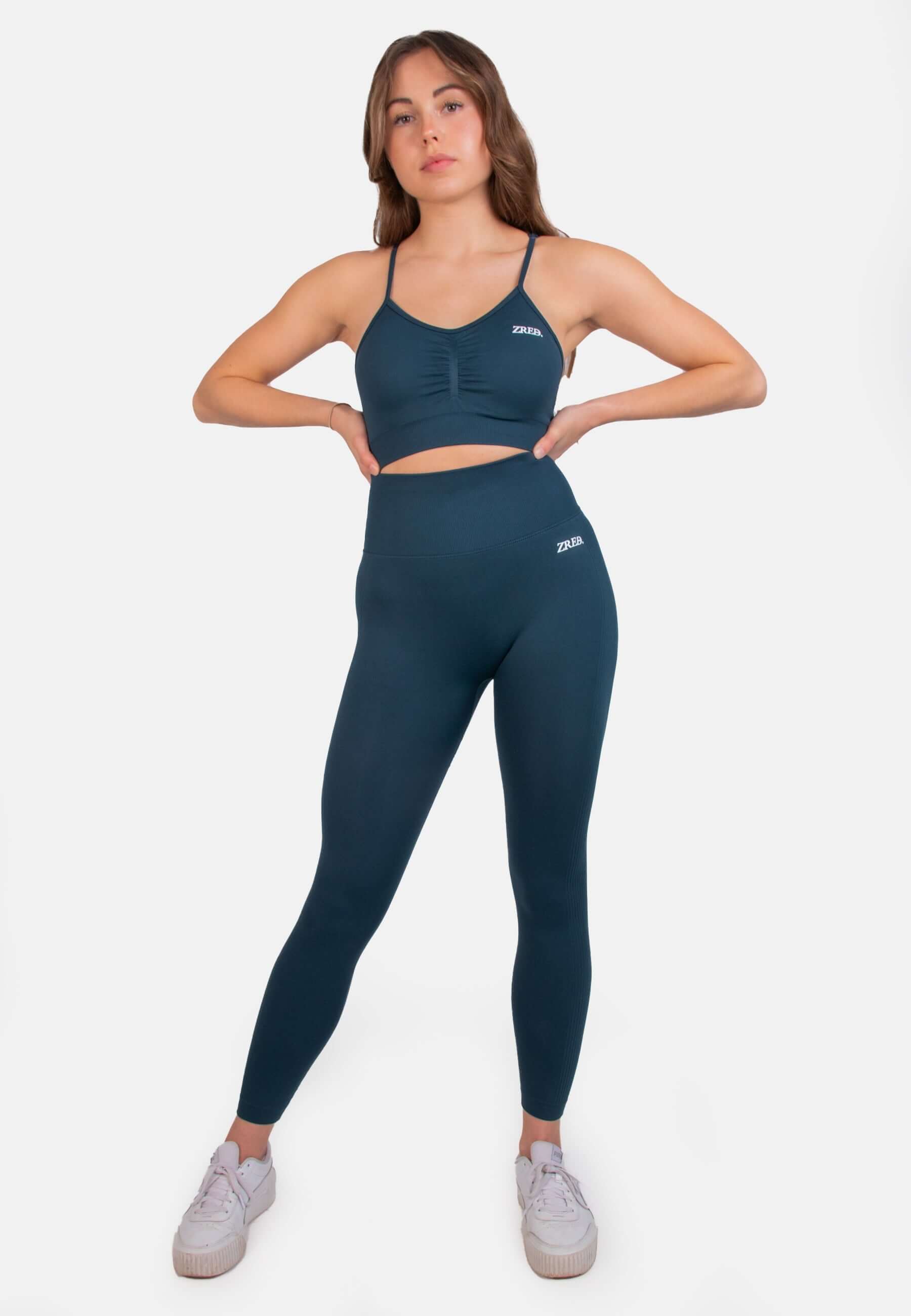 Model wearing Shape Seamless Sports Bra with leggings, showcasing optimal support for training.
